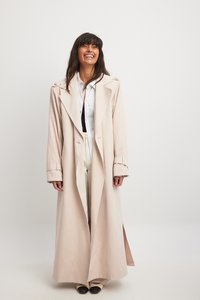 NA-KD LONG SHOULDER PAD - Kišni ogrtač - beige