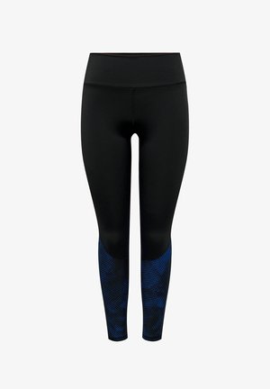 Svarta leggings med hög midja och blå mönstrade detaljer på underbenen. Tillverkade av elastisk, slät tyg.