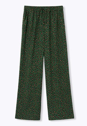 Pantalon vert à jambes larges avec taille élastique, avec un imprimé léopard marron et noir sur l’ensemble.