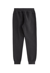 Sorte sweatpants med en blød tekstur, elastisk talje og tapered manchetter. Enkel design uden mønstre eller synlige hardware detaljer.