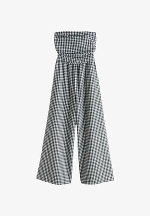 Salopetă fără bretele, cu imprimeu gingham alb-negru, dotată cu un șnur elastic strâns în talie și picioare largi, fluide. Confecționată dintr-un material ușor.