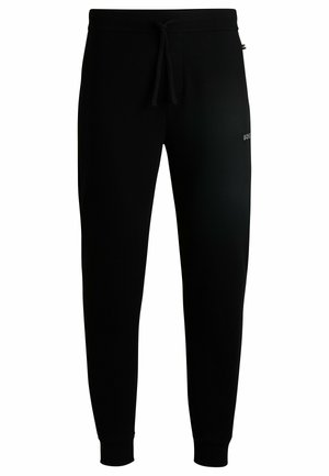 Pantalon de survêtement noir avec une taille élastique et un cordon de serrage, fabriqué dans un tissu texturé et avec des poignets ajustés aux chevilles. Logo sur le côté.