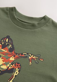 Niewybrane, khaki camo frog