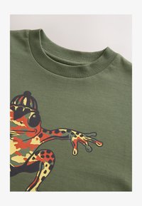 Niewybrane, khaki camo frog