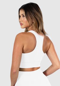 Smilodox AMAZE PRO RACERBACK BH - Sport-bh met medium support - creme