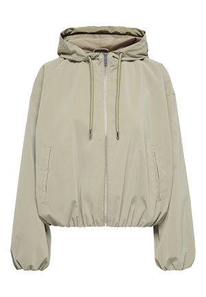 Šviesiai smėlinio spalvos striukė su kapišonu, užtrauktuku priekyje, kapišono raišteliais, elastingomis rankogalių juostomis ir dviem šoniniais kišenėmis.