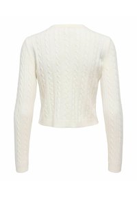 Pull crop en maille torsadée blanche à manches longues avec poignets et ourlet côtelés, vu de dos.