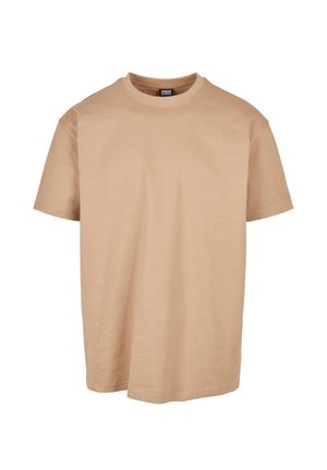 Beige katoenen t-shirt met een ronde hals, korte mouwen en een relaxed fit; heeft een gladde textuur en een minimalistisch design.