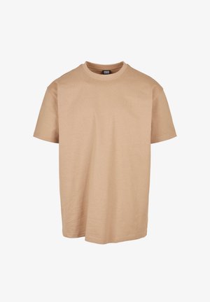 Beige katoenen t-shirt met een ronde hals, korte mouwen en een relaxed fit; heeft een gladde textuur en een minimalistisch design.