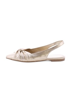 Slingback flat shoe in metallic gold, featuring a knotted front detail, pointed toe, and textured insole supported by a low heel.