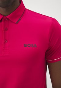 BOSS Pólóing - open pink