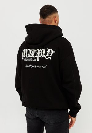 Black hooded sweatshirt featuring a large white graphic print on the back with text and logo. Made of textured fabric, regular fit.
