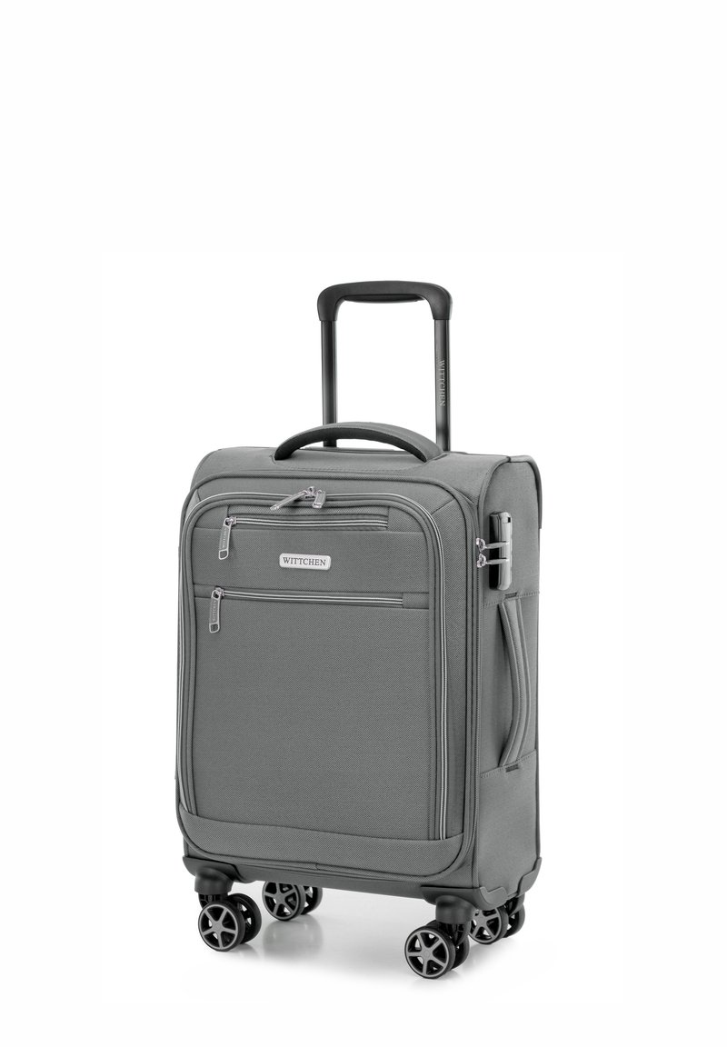 Grauer Trolley mit strukturiertem Stoffaußenmaterial, zwei vorderen Reißverschlusstaschen und einem ausziehbaren Griff. Vier doppelt rotierende Räder für gute Beweglichkeit.