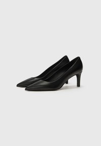 Black leather high-heeled shoes with a pointed toe design and a slim, tapered heel. Smooth texture with minimal accents.