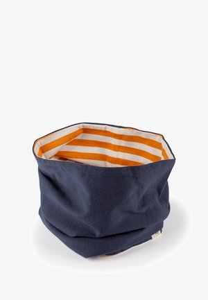 Navy fabric storage basket with an octagonal shape. Interior features alternating orange and white stripes. Soft texture, versatile use.