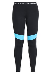 Mustat suoritusleggingsit, joissa on leveä musta vyötärönauha. Mukana on kirkas sininen raita yläreidessä. Valmistettu venyvästä ja sileästä kankaasta.