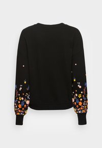 Black sweatshirt with floral embroidery in vibrant colors on the sleeves. Features a round neckline and ribbed cuffs for a fitted look.