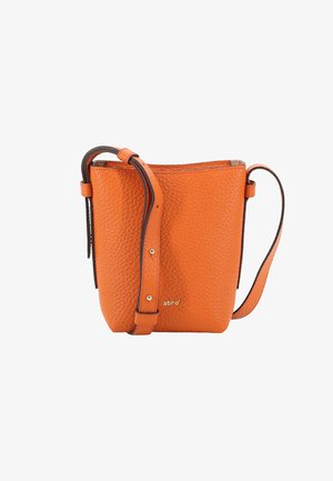 Orange leather bucket bag with a textured finish, adjustable strap, and a subtle logo detail on the front. Rounded shape with open top.