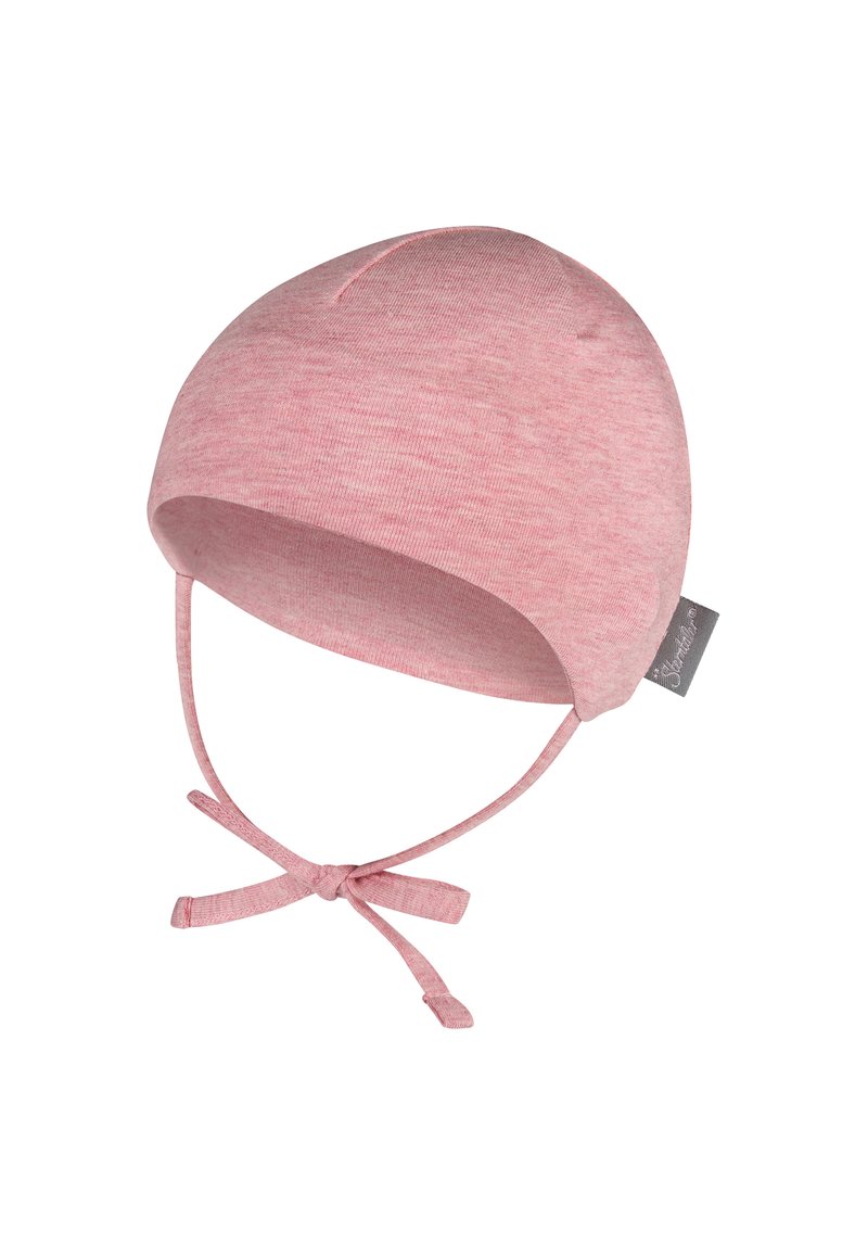 Pink cotton bonnet with a rounded shape, tie straps, and a smooth texture. Includes a small tag on the side.