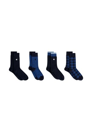 Vier paar herensokken in zwart- en blauwtinten, inclusief effen zwart, effen blauw, zwart met blauwe boorden en blauw geruit patroon.
