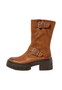 Brown leather ankle boot with a rounded toe, buckle accents on the side, and a chunky textured sole. Features a smooth finish.
