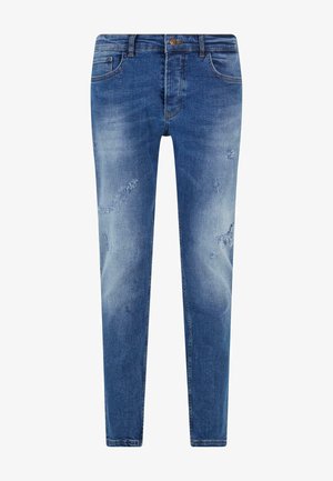 Jasnoniebieskie dżinsy o slim fit z wyraźnymi przetarciami i małymi uszkodzeniami. Pięć kieszeni w klasycznym fasonie oraz pas z szlufkami na pasek.