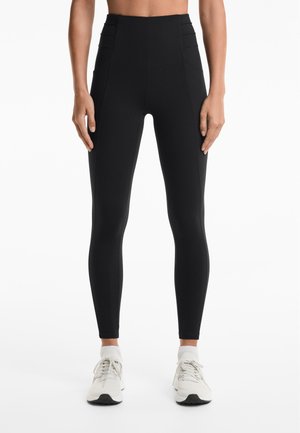 OYSHO EVERMOVE CREASE ANKLE-LENGTH - Tajice-hlače - black