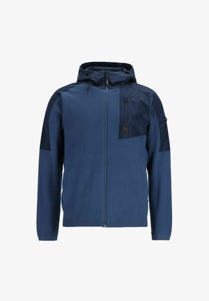 Sudadera con cremallera de color azul marino, hecha de una tela suave, que presenta un panel en contraste con un bolsillo en el pecho con cremallera y una capucha ajustable.