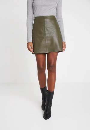 Jupe en cuir - green