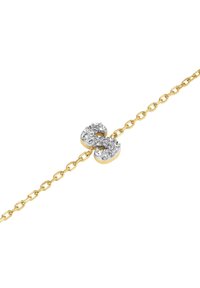 Gold chain bracelet featuring a silver-tone heart-shaped clasp adorned with clear crystals, highlighting its intricate design and texture.