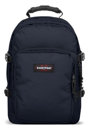 Navy blue Eastpak backpack made of durable fabric. It features a top handle, adjustable straps, and a front pocket with logo. Smooth texture.