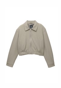 Lys beige cropped jakke med en struktureret krave, frontlynlås og elastisk talje. Har to sidelommer og lange ærmer.