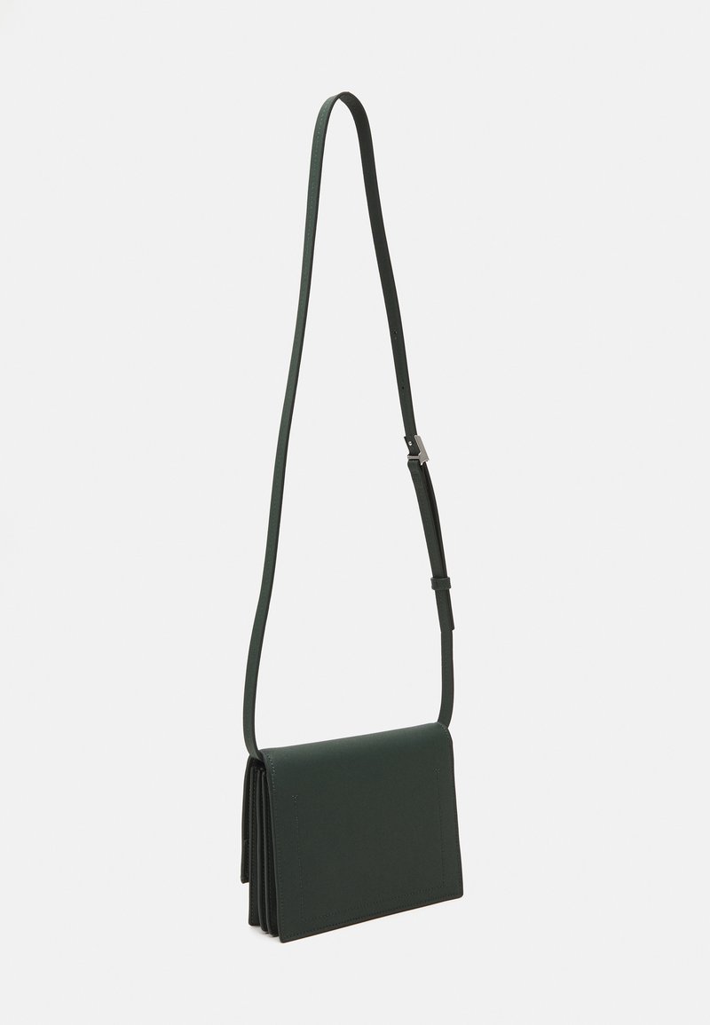 Calvin Klein LINEAR CROSSBODY - Alkalmi kézitáska - palm green