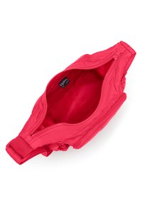 Fanny pack i lys pink nylon med en tekstureret overflade. Hovedrummet har en lynlås lukning; indvendig mærkat synlig.