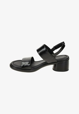 Black leather sandal with a rounded toe, two wide straps, a slingback design, and a low block heel. Smooth texture and sleek silhouette.