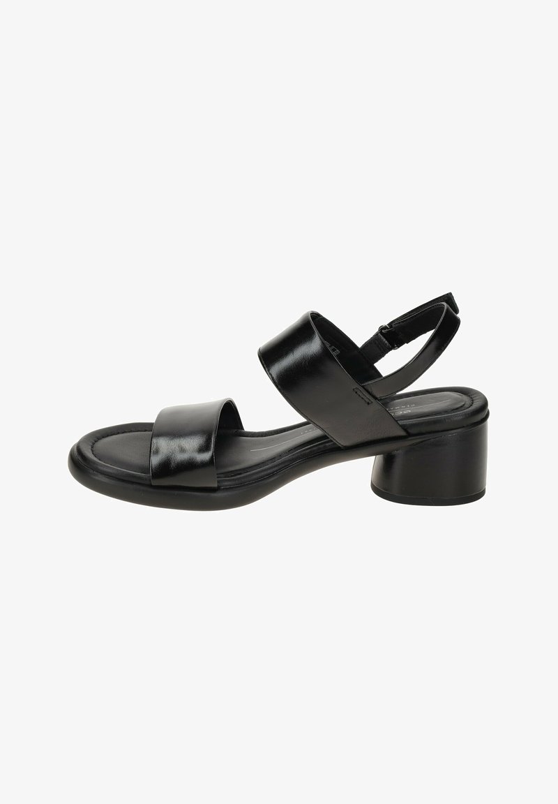 Black leather sandal with a rounded toe, two wide straps, a slingback design, and a low block heel. Smooth texture and sleek silhouette.