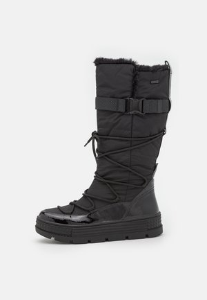 Botte noire isolée montée jusqu'au genou avec garniture en fausse fourrure, tissu texturé, semelle en caoutchouc et lacets ajustables. Dispose d'une sangle pour un ajustement sécurisé.
