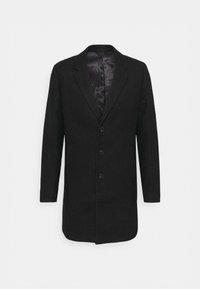 Černý vlněný kabát s texturovaným károvaným vzorem, jednorušný střih, klopové límce s výřezem a tři přední knoflíky. Podšívka uvnitř.