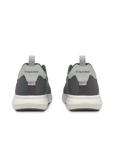 Gray shoes with a smooth rubber sole, textured suede accents, and a rear loop for easy wear. Features "Tropicfeel" branding.