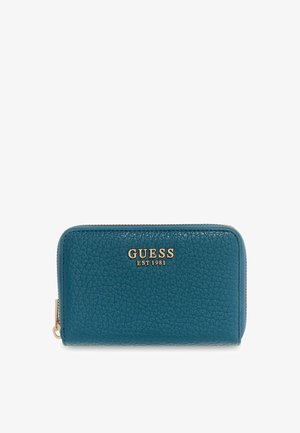 Portefeuille en cuir turquoise avec surface texturée, garnitures dorées et logo de la marque embossé. Dispose d'une fermeture éclair et d'une forme rectangulaire.