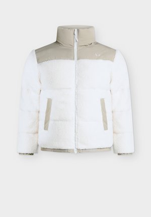 Veste polaire blanche avec panneaux beiges aux épaules, col montant, deux poches verticales devant et fermeture éclair à l'avant.