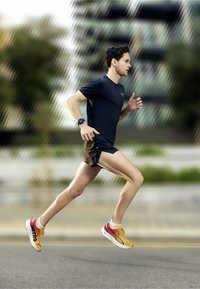 Puma DEVIATE NITRO
 - Scarpe da corsa su strada - sun stream sunset glow white