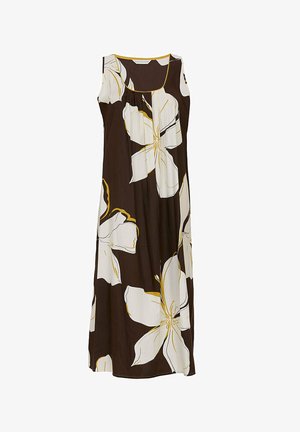 Mouwloze maxi-jurk van bruine stof, met grote witte bloemen omlijnd in het geel. Rechte silhouet en zachte textuur.
