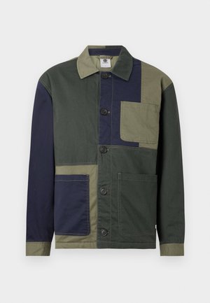 Button-up jacket with patchwork design in dark green, navy, and olive, featuring three large front pockets and a collar.