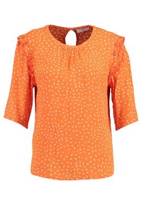 Orange bluse med korte ærmer, med en rund halsudskæring og nøglehul på ryggen. Pyntet med hvide bladdesign og rynkede detaljer.