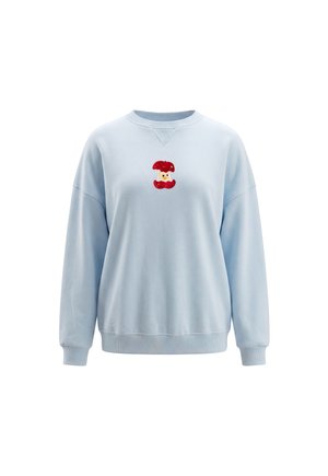 Lyseblå langærmet sweatshirt med ribbet manchetter og kant, med et rødt og gult æblekernehus-grafik på brystets midterområde.