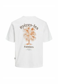 Bílé tričko s krátkým rukávem, na kterém je grafika hnědé palmy a nápis "Hyères-les Palmiers" vytištěný na zádech. Bavlněný materiál.