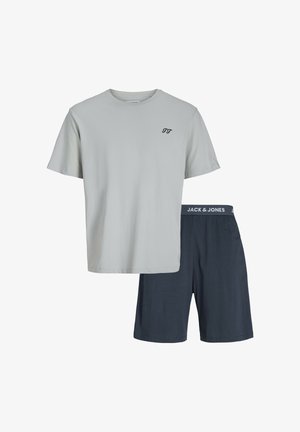 Gray cotton t-shirt with black logo and short navy blue shorts featuring a branded waistband, featuring a smooth texture and a relaxed fit.