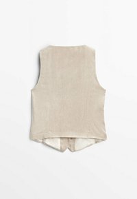 Beige, geripptes ärmelloses Oberteil mit hohem Hals und gespaltenem Saum hinten. Der Stoff hat eine weiche Textur und ein glattes Innenfutter.