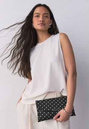 Next, Clutch - black/white polka dot
